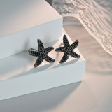1 par de pendientes elegantes de circonita de cobre con incrustaciones de estrella de mar para mujer