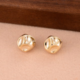 1 par de pendientes chapados en oro de 14 quilates de cobre chapado irregular de color sólido de estilo simple