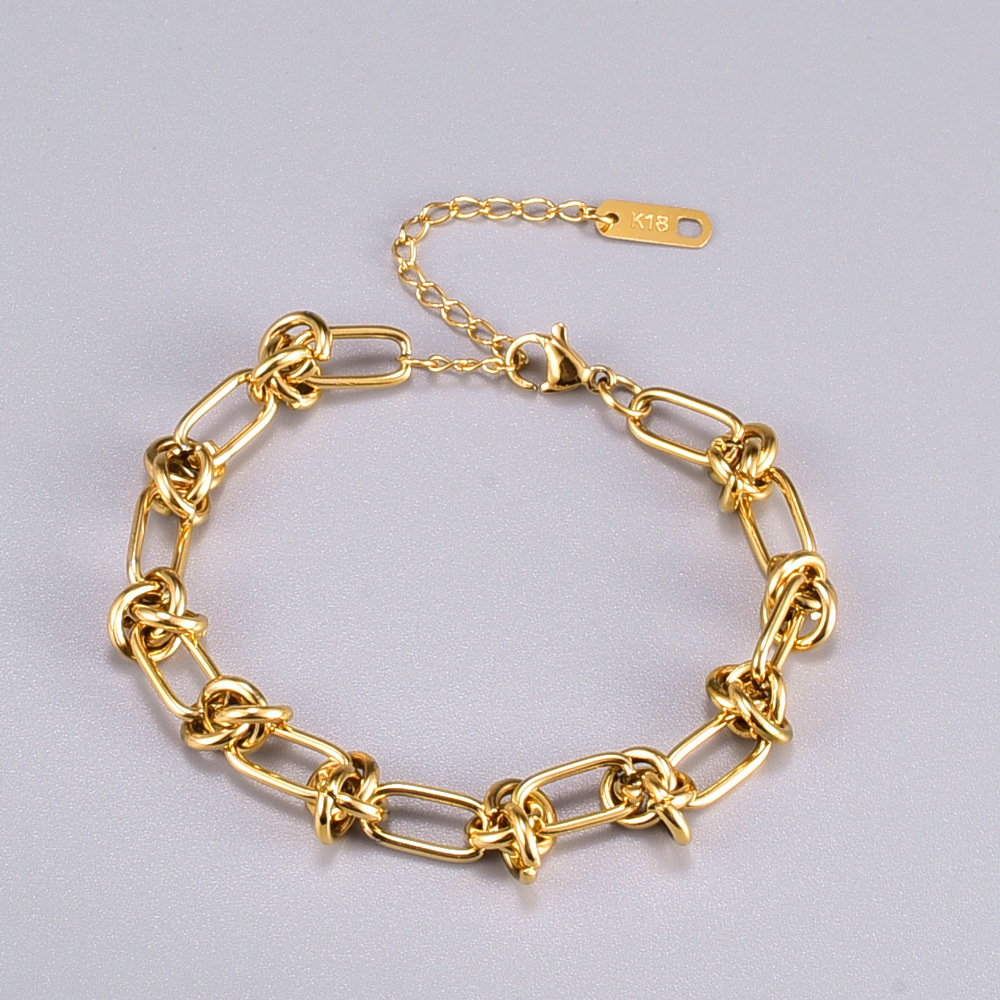 Pulseras chapadas en oro de 18 quilates de acero titanio con nudo de estilo simple