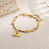 Pulseras chapadas en oro en capas de perlas de imitación de acero inoxidable mariposa ojo del diablo cruz artística informal