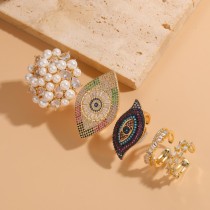 Anillos abiertos chapados en oro de 14 quilates con incrustaciones de perlas asimétricas y ojo de diablo de estilo clásico elegante
