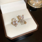 1 par de pendientes de circón de cobre con perlas de imitación con incrustaciones de flores en forma de corazón cruzado de estilo Simple para mujer