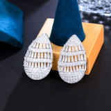 1 par de pendientes de tuerca chapados en rodio chapados en oro blanco con incrustaciones de piedras preciosas artificiales de cobre con incrustaciones de nudo de lazo ovalado de estilo Simple elegante