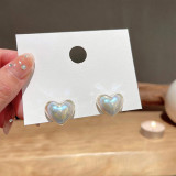 1 par de pendientes de circón con incrustaciones de cobre y perlas artificiales con forma de corazón y lazo de flor a la moda