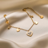 Collar de pulseras chapado en oro de 18 quilates con incrustaciones de acero de titanio con forma de corazón de viaje de estilo simple