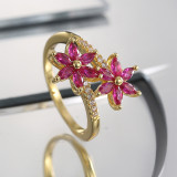 Anillos de circón con incrustaciones de cobre y flor de viaje