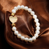 Rueda de tarjeta pulsera de perlas de concha nueva coreana pulsera de acero inoxidable de amor pulsera de mujer de estilo creativo al por mayor