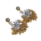 1 par de pendientes colgantes con diamantes de imitación de cobre con incrustaciones de flores de estilo étnico
