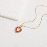 Collar con colgante chapado en oro de 14 quilates con incrustaciones de cobre y circonita elegante en forma de corazón