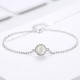 Pulseras chapadas en oro blanco de jade con incrustaciones de cobre redondas elegantes