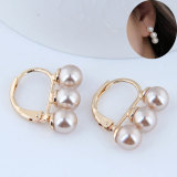 1 par de elegantes pendientes de perlas de cobre con incrustaciones geométricas