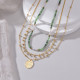 Collar con colgante redondo de cuentas de acero inoxidable Commute