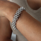 Collar de pulseras ahuecadas con revestimiento de acero de titanio de color sólido estilo simple informal
