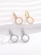 1 par de elegantes y lujosos pendientes de gota chapados en oro blanco con incrustaciones de cobre y circonita chapada en oro blanco