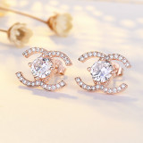 Pendientes elegantes de circonita con diamantes de cobre y nudo de lazo a la moda
