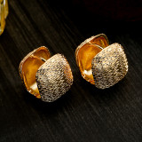 1 par de pendientes chapados en oro de 18 quilates chapados en cobre de color sólido estilo sencillo