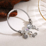 Brazalete de diamantes de imitación con incrustaciones de aleación de acero inoxidable con llave de mariposa redonda bonita y elegante