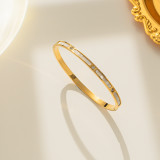Brazalete chapado en oro de Shell de diamantes de imitación con incrustaciones de acero de titanio de color sólido de estilo simple