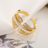 Lujoso anillo abierto chapado en oro de 18 quilates con incrustaciones de cobre geométrico y circón