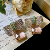 1 par de pendientes colgantes de cristal con perlas artificiales de cobre con incrustaciones de nudo de lazo agradable
