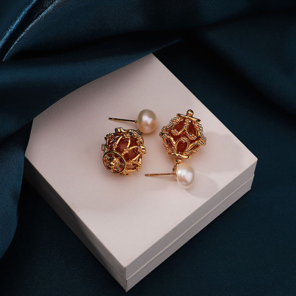 1 par de pendientes colgantes chapados en oro de 18 quilates con incrustaciones de flores y piedra natural de cobre
