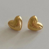 1 par de aretes de cobre chapados en forma de corazón de estilo simple