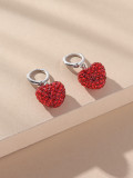 Pendientes colgantes con diamantes de imitación y incrustaciones de cobre en forma de corazón a la moda, 1 par