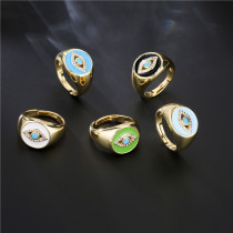 Aogu suministro transfronterizo moda europea y americana nuevo chapado en cobre anillo abierto de ojo de diablo de circón que gotea en oro de 18 quilates