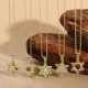 Collar con colgante chapado en oro de 14 quilates con incrustaciones de cobre y estrella de estilo clásico lujoso y elegante