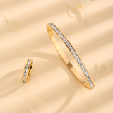 Pulseras de anillos chapadas en oro de 18 quilates con incrustaciones de acero de titanio de color sólido elegante