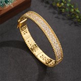 Brazalete chapado en oro de 18 quilates con incrustaciones de circonita y hebilla de cobre redonda lujosa Glam