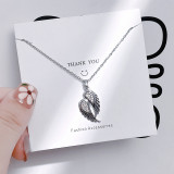 Collar con colgante de perlas de diamantes de imitación con incrustaciones de acero de titanio y flor humana de estilo Simple informal