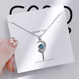 Collar con colgante de perlas de diamantes de imitación con incrustaciones de acero de titanio y flor humana de estilo Simple informal