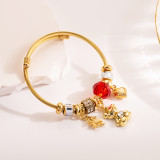 Brazalete chapado en oro de diamantes de imitación con incrustaciones de acero de titanio de aleación de oso dulce romántico lindo