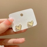 Pendientes de diamantes de imitación con incrustaciones de cobre con nudo de lazo en forma de corazón dulce 1 par