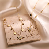 Collar de pulseras chapado en oro de 18 quilates con incrustaciones de acero de titanio con forma de corazón de viaje de estilo simple