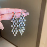 Pendientes de diamantes de imitación con incrustaciones de cobre en forma de corazón de estilo simple