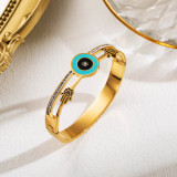 Brazalete chapado en oro de 18 quilates con circonita esmaltada de acero inoxidable y ojo de luna y estrella artística de estilo clásico