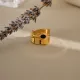 Venta al por mayor de anillos de circón chapados en oro con incrustaciones de acero inoxidable ovalados de estilo moderno de Hip-Hop Rock
