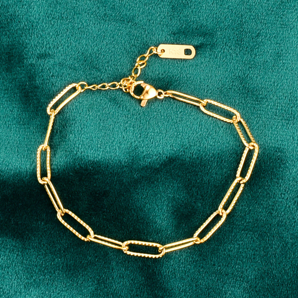 joyería Pulsera simple con relieve corto de oro de 18 quilates Joyería al por mayor