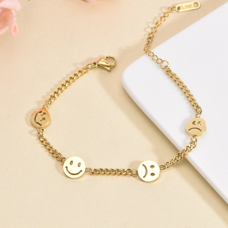 Pulseras chapadas en oro con revestimiento de acero de titanio con cara sonriente linda