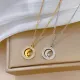 Estilo simple Estilo clásico Luna Chapado en acero de titanio Incrustaciones de piedras preciosas artificiales Collar con colgante chapado en oro