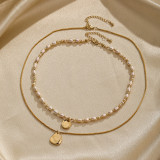 Collares de doble capa chapados en oro de 18 quilates con revestimiento de cobre de color sólido con gotas de agua redondas de moda elegante