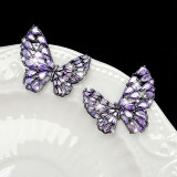 1 par de pendientes de diamantes de imitación de cobre con incrustaciones huecas chapados en mariposa brillante estilo IG