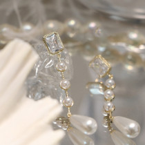 1 par de elegantes pendientes colgantes de circonita con perlas de cobre y incrustaciones rectangulares de estilo vintage