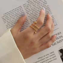 Anillo de acero de titanio con bola de acero con resorte de doble capa con diseño de nicho francés