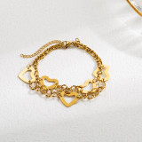 Pulseras chapadas en oro con perlas de imitación de acero inoxidable con forma de corazón de palma y ojo de diablo de estilo moderno al por mayor
