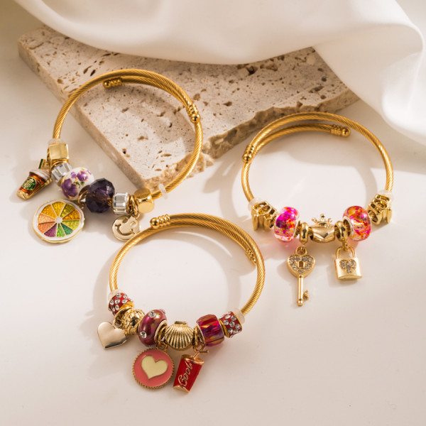 Brazalete de circón de aleación de acero inoxidable con forma de corazón de limón y ojo de diablo estilo INS al por mayor