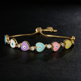 Pulsera de ojo en forma de corazón con gota de aceite de circonio con microincrustaciones de oro de 18 quilates con revestimiento de cobre a la moda