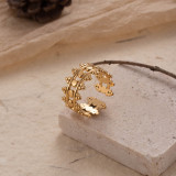 Anillo abierto chapado en oro de 18 quilates con revestimiento de acero inoxidable y luna infinita cruzada de estilo moderno